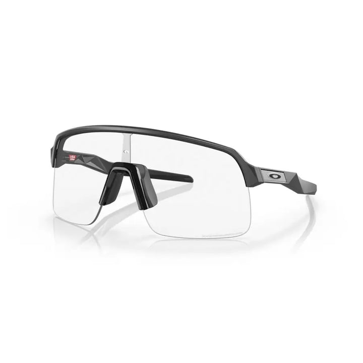 Occhiali Oakley Sutro lite Matte Carbon Lente Clear To Black Iridium Fotocromatica