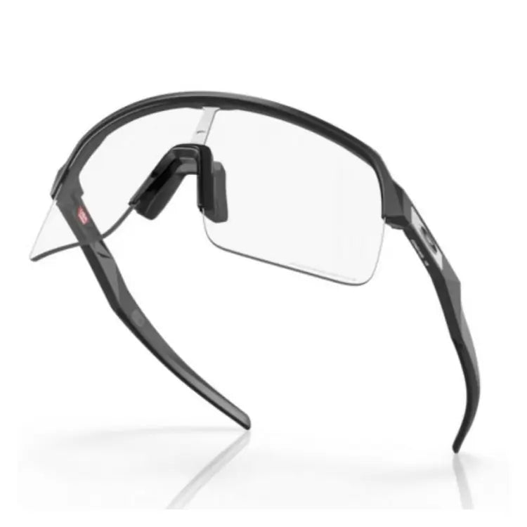 Occhiali Oakley Sutro lite Matte Carbon Lente Clear To Black Iridium Fotocromatica